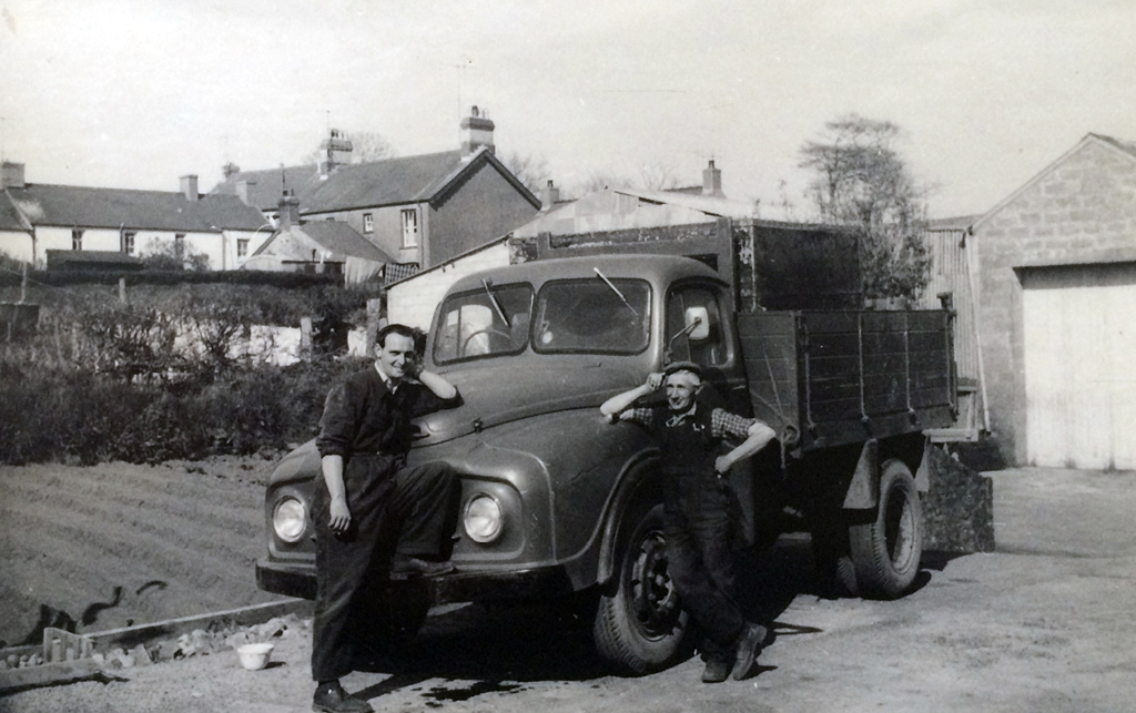 Billy & Harold Lewis... Guess which one set those drills of potatoes